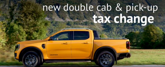 High-resolution image of a yellow double cab pickup truck with the text 'new double cab & pick-up tax change' in bold white font.