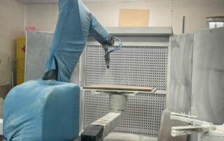 A image of a robotic spayer cover in a light blue cloth